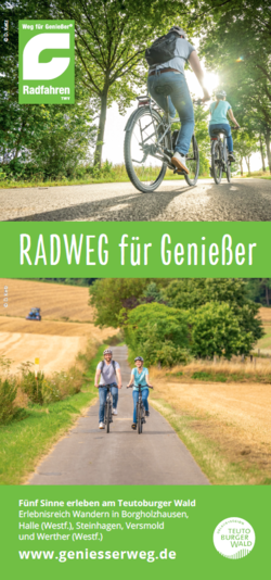 Zwei Fahrradfahrer auf einem Weg sind zu sehen.
