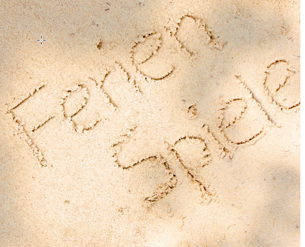 Ferienspiele ist in Sand geschrieben.